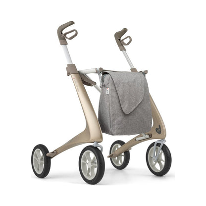 byACRE Carbon Ultralight Komfort Rollator in Champagner, Schrägansicht mit grauer Tasche